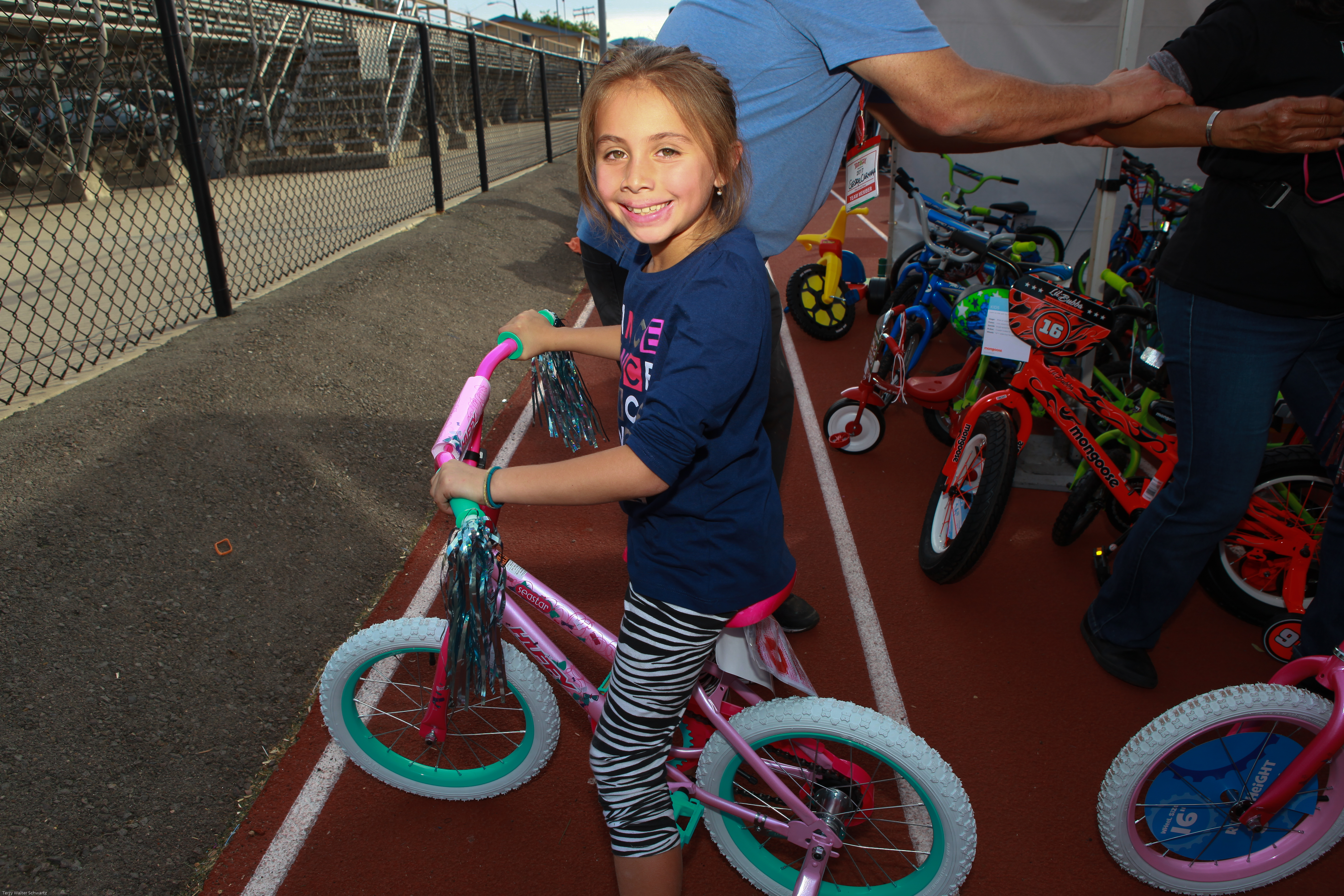 Happy girl riding a bike